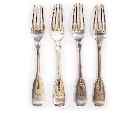 A SET OF FOUR GEORGE III FIDDLE PATTERN SILVER TABLE FORKS by Solomon Haugham, with stags head crest and marks for London 180