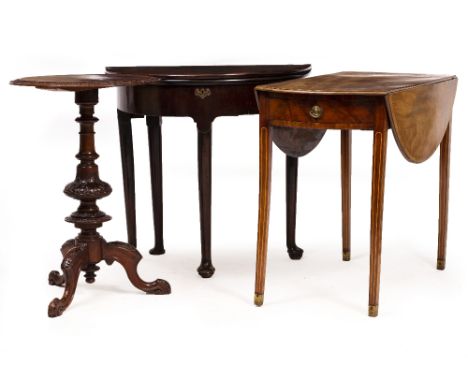 A VICTORIAN WALNUT CIRCULAR TRIPOD TABLE with burr walnut veneer to the top, the circular top with a carved border above a tu