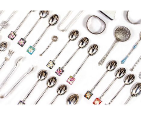 A SMALL GROUP OF WHITE METAL SPOONS some silver, some marked stirling, approximately 106 grams in weight together with a smal