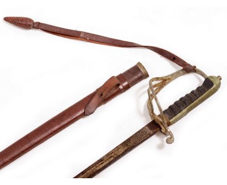 AN EARLY 20TH CENTURY ROYAL ARTILLERY OFFICERS DRESS SWORD with etched steel blade, fish skin grip and reeded guard, complete