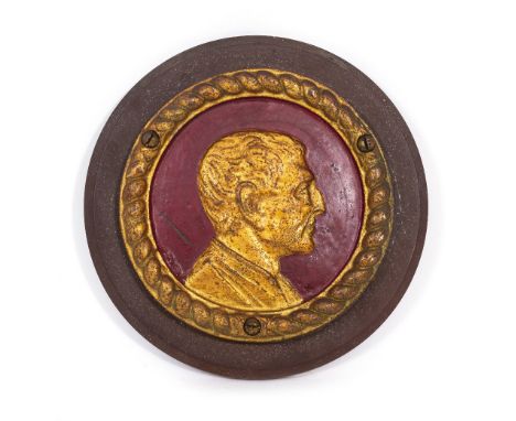 A CAST METAL BOAT BADGE HMS Iron Duke, depicting a head and shoulder relief of Arthur Wellesley First Duke of Wellington, 17.
