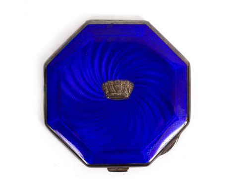 A 1930s BLUE ENAMEL AND ENGINE TURNED SILVER COMPACT of octagonal form with a central crest, having marks for Birmingham 1936