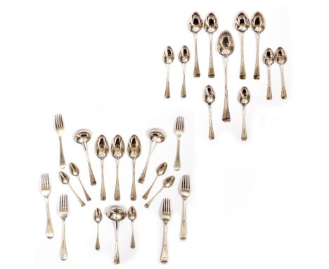 A GROUP OF GEORGE III SILVER OLD ENGLISH PATTERN CUTLERY each piece with a similar bird crest and all pieces assayed in Londo