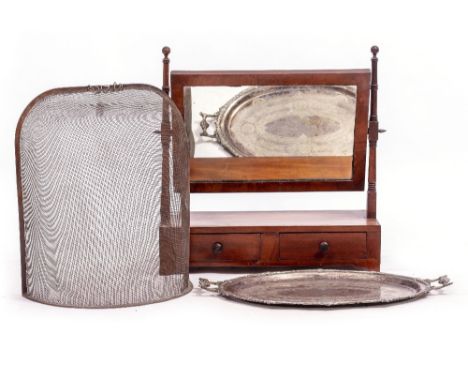 A PAIR OF EARLY 19TH CENTURY OVAL SILKWORK FLOWER PICTURES each on a black ground, 15cm x 21cm together with a further silkwo