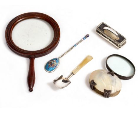 A MAHOGANY MAGNIFYING GLASS with turned handle, 13cm diameter together with a white metal and mother of pearl folding magnify