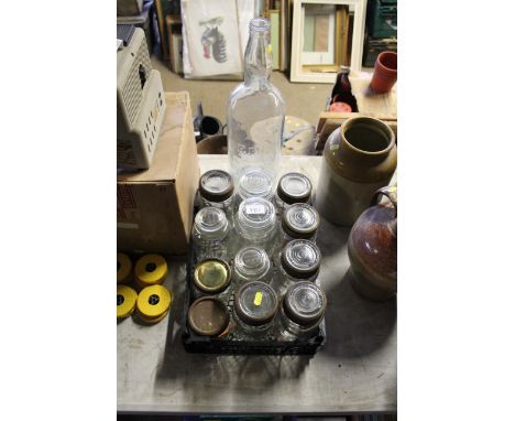A quantity of Kilner storage jars, a large glass Scotch Whisky bottle etc
