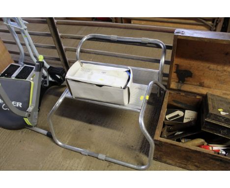 A set of aluminium caravan steps and a Screwfix basin mixer tap