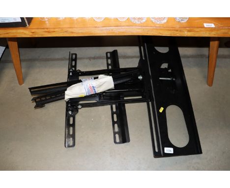 An adjustable wall mounting TV bracket 