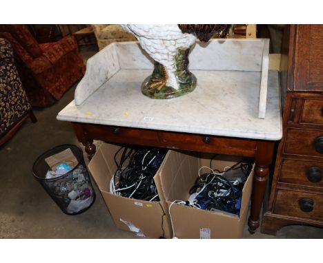 A Victorian mahogany marble topped wash stand fitted two drawers and raised on ring turned supports