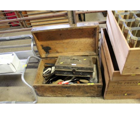 A metal tin containing various hand tools to include hand brace, adjustable wrenches etc. and a wooden tool chest with conten