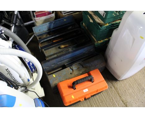 A metal cantilever tool box and contents of hand tools, a further metal tool box and contents of various sockets and a plasti