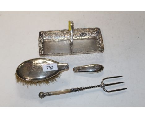 A silver backed hair brush AF, a plated and Mother of Pearl handled pickle fork and a white metal basket