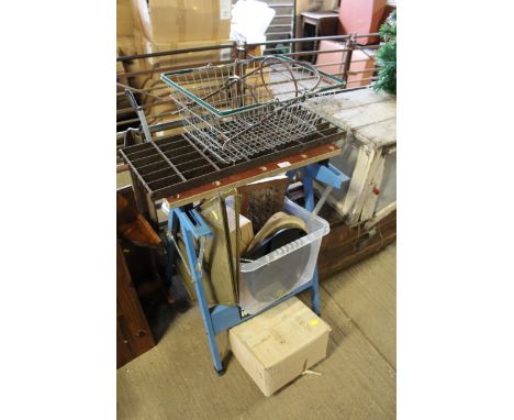 A small three tier metal plant stand; a wire shopping basket; a metal grate; a folding workmate; a small footstool etc.