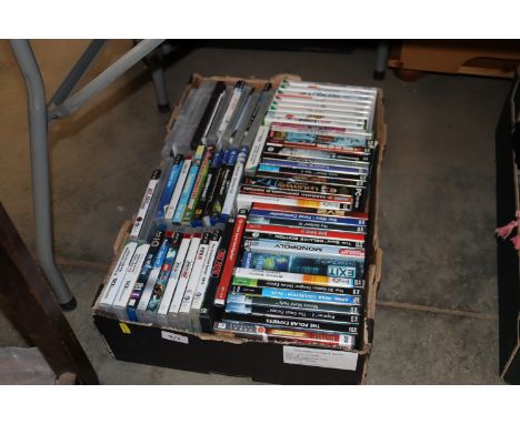 A box containing various computer and console games