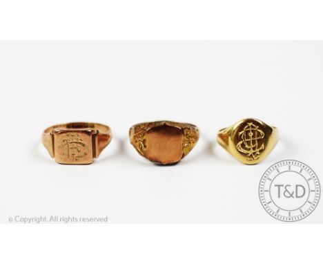 An 18ct yellow gold signet ring with engraved monogram, hallmark rubbed, weight 6.4gms with two further 9ct yellow gold signe