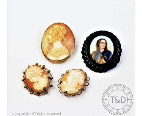 Three carved shell cameo brooches, to include, a lady wearing a bonnet in profile, in yellow metal surround stamped '9ct', wi