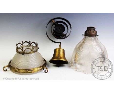 A brass servants bell, marked 6 1/2, 24.5cm high with two glass and metal mounted light shades and a large chestnut roasting 