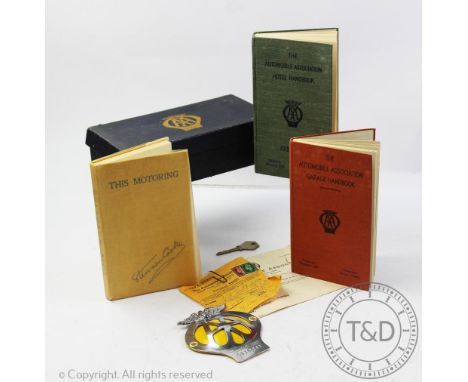 An AA Automobile Association membership box, with car badge numbered 0936341, membership key numbered 4380848, hotel book, ga