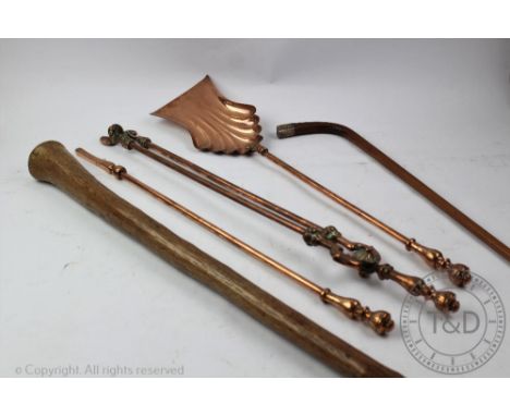 A silver topped walking stick, along with a copper companion set and a further walking stick or gnarled wooden form (5)