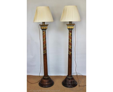 A pair of Arts and Crafts type carved and painted oak standard lamps (converted from jardinière stands), 148cm highProvenance