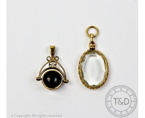 A rock crystal set Victorian pendant, of oval form, with yellow metal pierced frame, 4.1cm long with a later 9ct yellow gold 