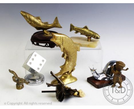 A selection of assorted car mascots and similar, to include, A bronzed figure of an Art Deco lady, seated and playing a banjo