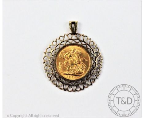 An Edward VII gold sovereign dated 1902 within 9ct yellow gold pendant setting, gross weight 11.3gms 