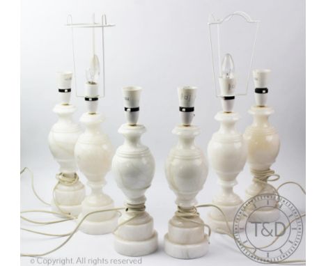 A matched set of six white marble table lamps, with turned detailing, 29.5cm highProvenance: Yeaton Peverey Hall CONDITION RE