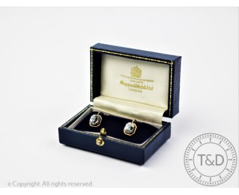 A pair of aquamarine set earrings, each designed as a cushion shaped aquamarine within canted square, yellow metal setting, u