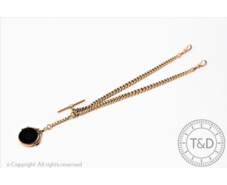 A 9ct gold double watch albert, designed as a graduated curb link suspending a central T bar and swivel inset with bloodstone