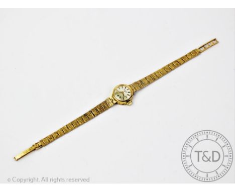 A 9ct gold Rotary ladies wristwatch, London 1978, the circular case enclosing silvered dial with batons, movement stamped '17