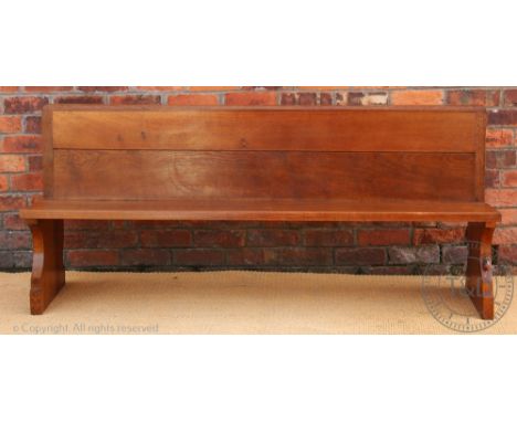 A Robert 'Mouseman' Thompson light oak settle / pew, probably 1960's, made for a church or chapel, 80cm H x 183cm W x 52cm D