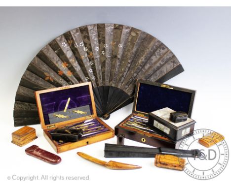 A collection of boxes and treen to include, a 19th century walnut and white metal mounted snuff box, 8.5cm wide, a cylindrica