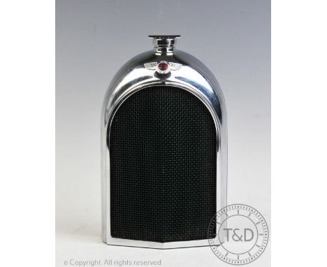 A Bentley chrome spirit decanter attributed to Ruddspeed, modelled as a Bentley car radiator, 20cm