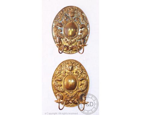 A part set of five 18th century style brass twin branch wall sconces with oval back plates, in the Dutch style, late 20th cen