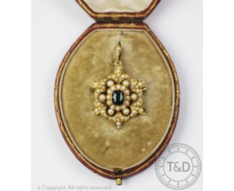 A Victorian tourmaline and untested pearl set brooch/pendant, designed as a stylised floral pendant, set throughout with grad