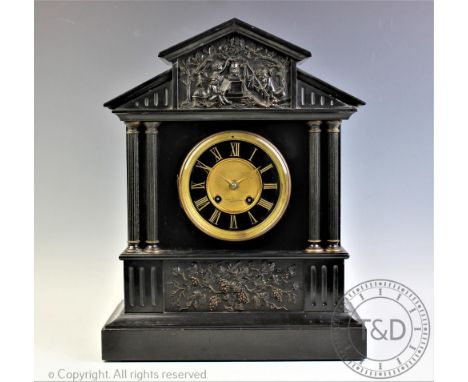 A large Victorian slate mantel clock, the clock of architectural form with relief entablature supported by four fluted column