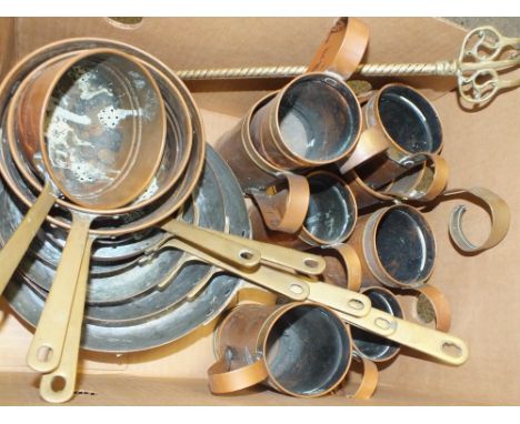 A COLLECTION OF VINTAGE COPPER MEASURES AND SAUCEPANS