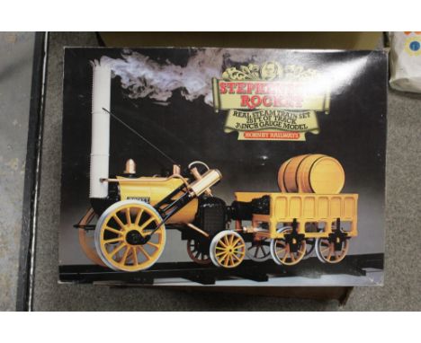 A VINTAGE BOXED HORNBY REAL STEAM MODEL OF STEPHENSONS ROCKET, a 3 1/2" model with forward and reverse gear plus 25 feet of t