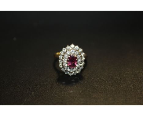 AN 18 CARAT GOLD RUBY AND DIAMOND RING, RING SIZE J 1/2 WITH RESIZER, APPROX WEIGHT 6.9G