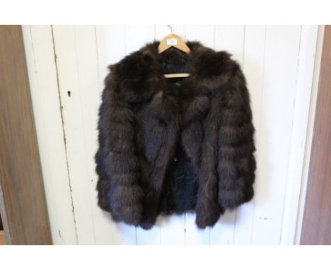 A VINTAGE LADIES FUR JACKET 