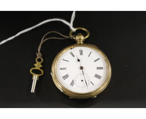 A BRASS OPEN FACED MANUAL WIND POCKET WATCH AND KEY