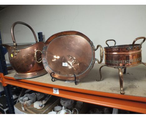 A LARGE COPPER HELMET SHAPED COAL BUCKET, TOGETHER WITH A TWIN HANDLED SERVING TRAY AND A  SMALL BUCKET RAISED ON CABRIOLE LE