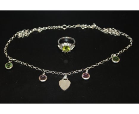 A SILVER AND GREEN STONE RING AND NECKLACE APPROX WEIGHT - 13.5G 