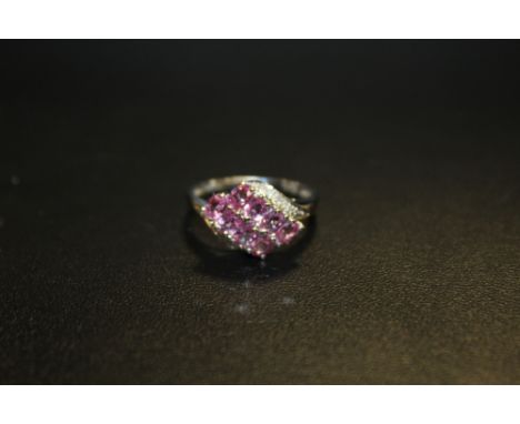 A 9 K WHITE GOLD PINK SAPPHIRE DRESS RING, RING SIZE P APPROX WEIGHT 2.5G