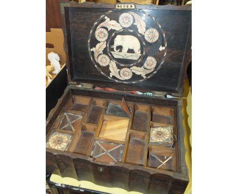 AN ANTIQUE WOODEN WORKBOX WITH FITTED INTERIOR - FOR RESTORATION, the hardwood frame shaped to all four sides, the hinged lid