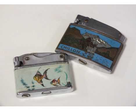 A VINTAGE PENGUIN LIGHTER TOGETHER WITH A SUNFLOWER EXAMPLE
