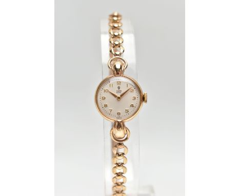 A 9CT GOLD 'TUDOR' WRISTWATCH, hand wound movement, round dial signed 'Tudor Royal', Arabic numerals, polished yellow gold ca