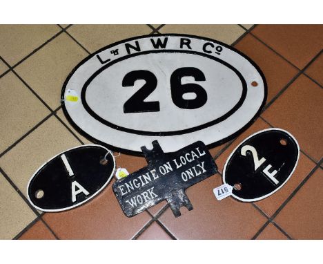 FOUR CAST IRON RAILWAY SIGNS, comprising an oval L &amp; NWR Co. 26 (London &amp; North Western Railway 1846-1922) sign, widt