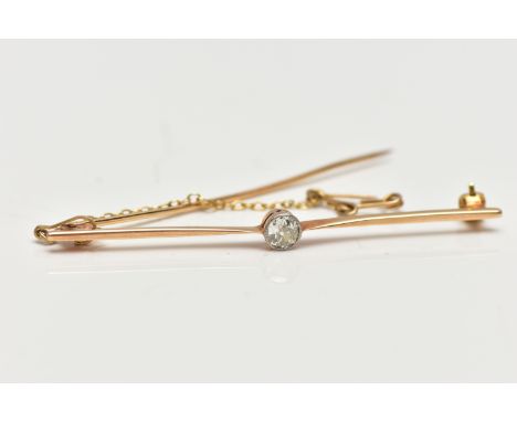 A YELLOW METAL DIAMOND BAR BROOCH, designed with a milgrain set old cushion cut diamond, estimated diamond weight 0.30cts, to